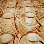 Angel Sarkela-Saur created this original "Awaiting Fulfillment" Coffee Art® painting. It features stacks of empty cups waiting to be filled with coffee.