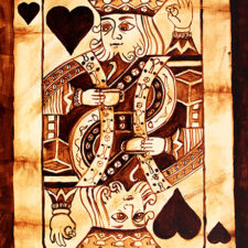 Angel Sarkela-Saur created this original "Coffee King" Coffee Art® painting. It features the King of Hearts playing card holding a cup of coffee and a sugar cube in the other hand.