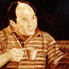 Andrew Saur and Angel Sarkela-Saur created this original "Costanza" Coffee Art® painting. It features George Costanza enjoying a cup of coffee with his pal, Jerry, at the coffee shop.