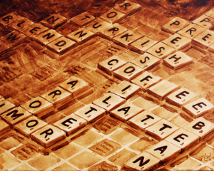 Angel Sarkela-Saur created this original "Double Coffee Score" Coffee Art&reg; painting. It features a popular board game with coffee related words.