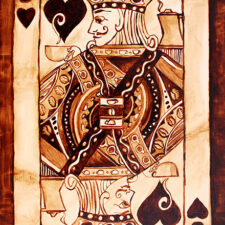 Angel Sarkela-Saur created this original "Jack of All Coffee" Coffee Art® painting. It features a Jack playing card holding a cup of coffee.
