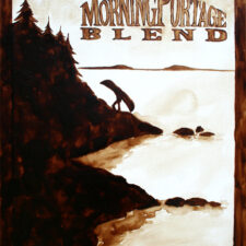 Andrew Saur & Angel Sarkela-Saur created this original "Morning Portage Blend" Coffee Art® painting. It features a person portaging a canoe at daybreak.