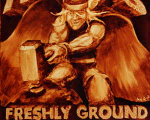Andrew Saur and Angel Sarkela-Saur created this original "Thor's Freshly Ground Coffee" Coffee Art&reg; painting. It features the Norse god, Thor, using his hammer to smash a coffee bean.